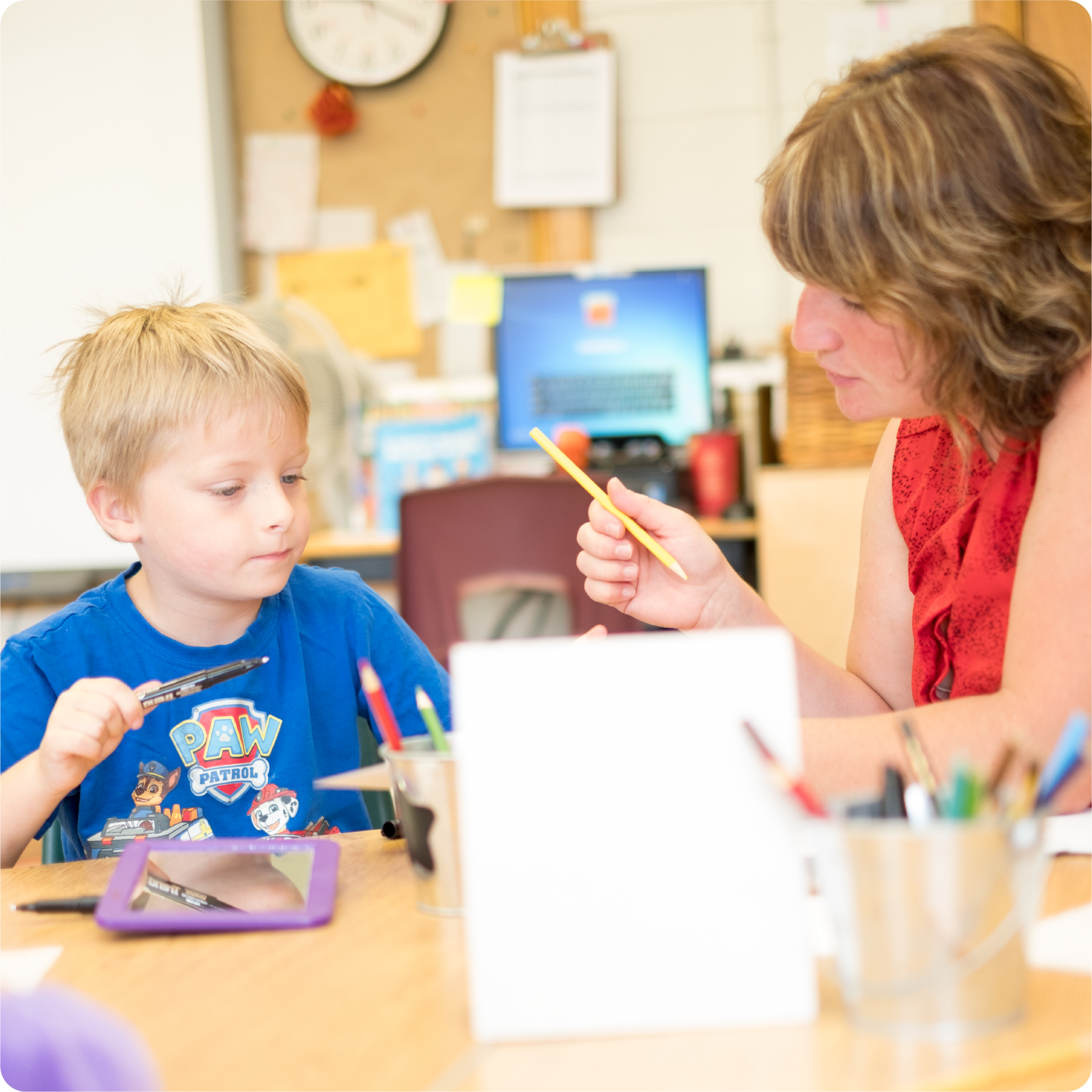 Teacher and Child in a Classroom