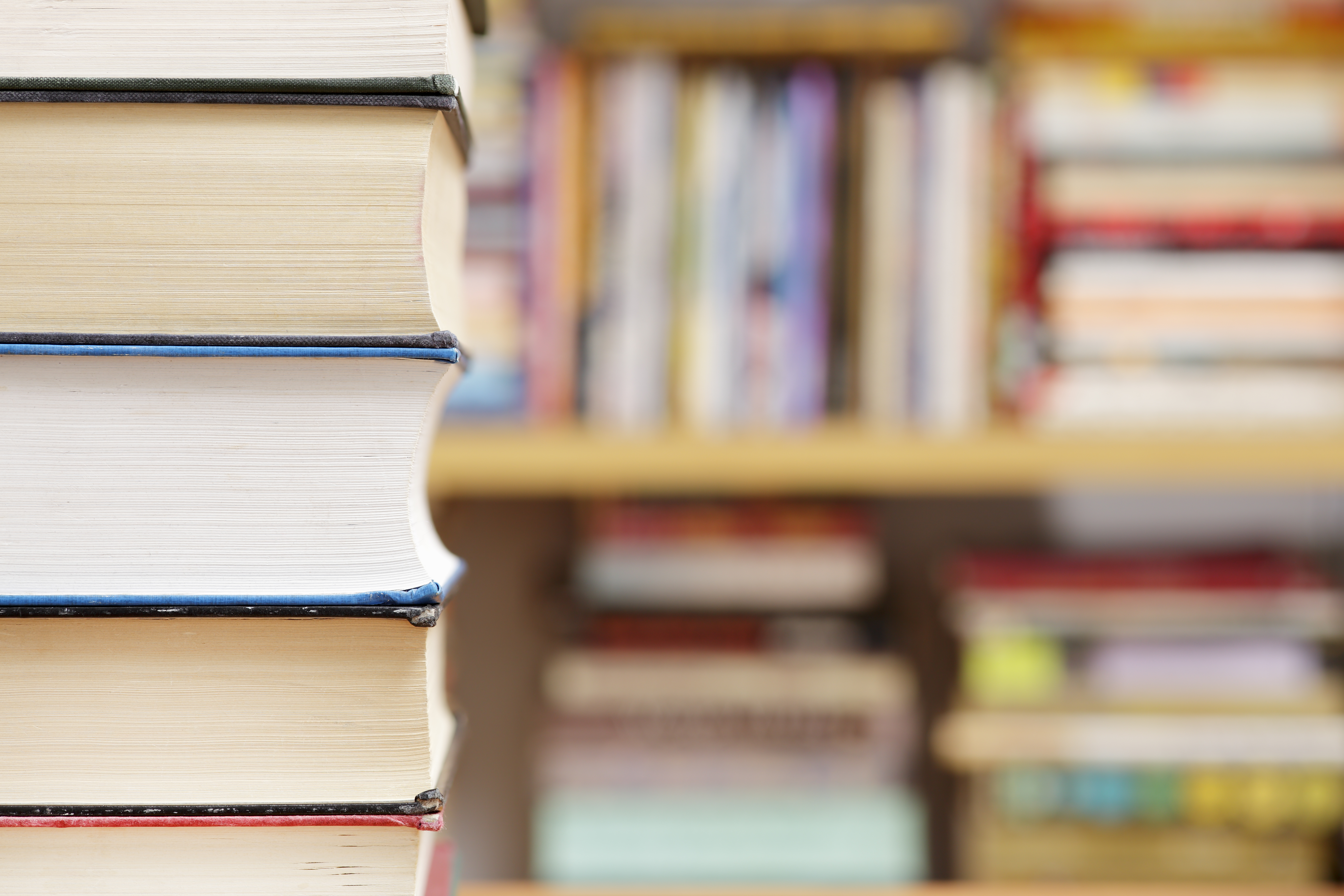 stacked books in library